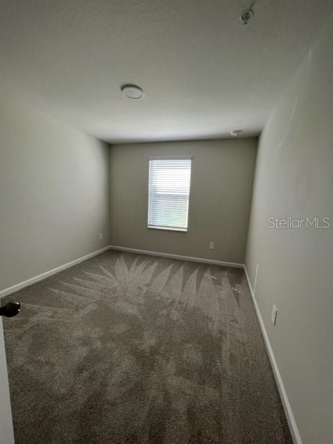 2327 Prickly Pear Way Sanford, FL 32771 - Photo 16 of 33 an empty room with a window
