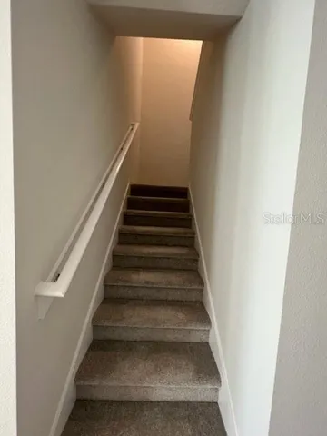 a bathroom with a sink mirror toilet and bathtub