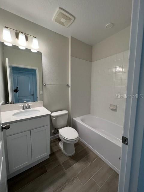2327 Prickly Pear Way Sanford, FL 32771 - Photo 25 of 33 a bathroom with a sink mirror toilet and bathtub