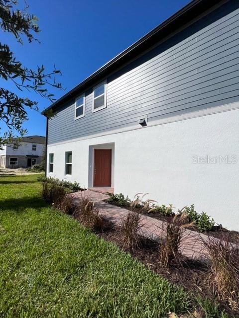 2327 Prickly Pear Way Sanford, FL 32771 - Photo 29 of 33 a view of a house with a backyard