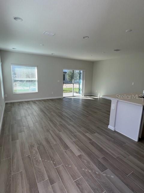 2327 Prickly Pear Way Sanford, FL 32771 - Photo 3 of 33 a view of empty room with wooden floor and fan