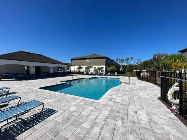 a view of a house with swimming pool