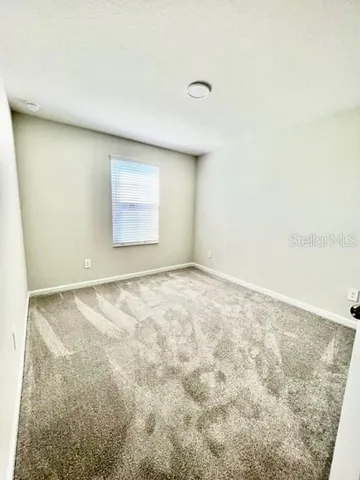 an empty room with a natural light