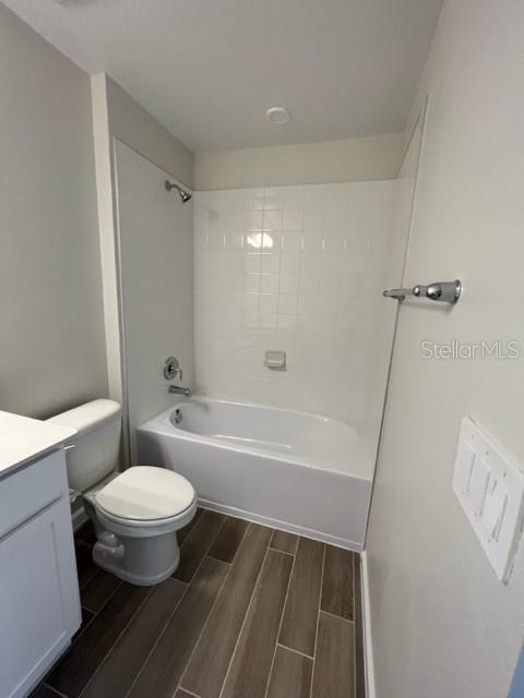 2327 Prickly Pear Way Sanford, FL 32771 - Photo 8 of 33 a bathroom with a toilet a sink and bathtub