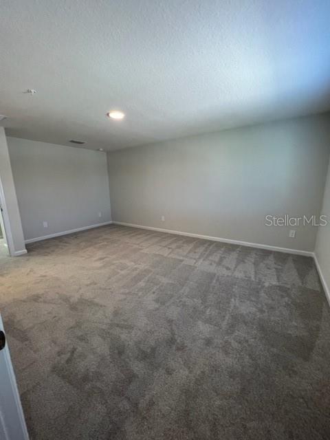 2327 Prickly Pear Way Sanford, FL 32771 - Photo 10 of 33 an empty room with a natural light