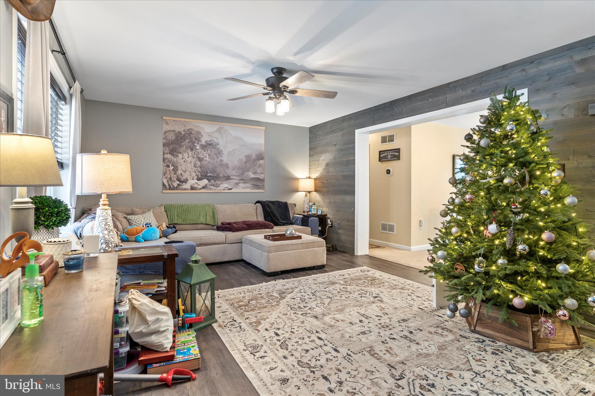 1565 Fox Hollow Road Shermans Dale, PA 17090 - Photo 12 of 41 a living room with furniture and a potted plant