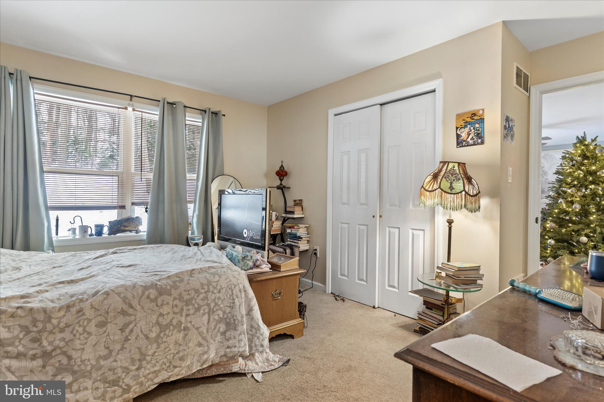 1565 Fox Hollow Road Shermans Dale, PA 17090 - Photo 22 of 41 a bed room with a bed mirror and a window