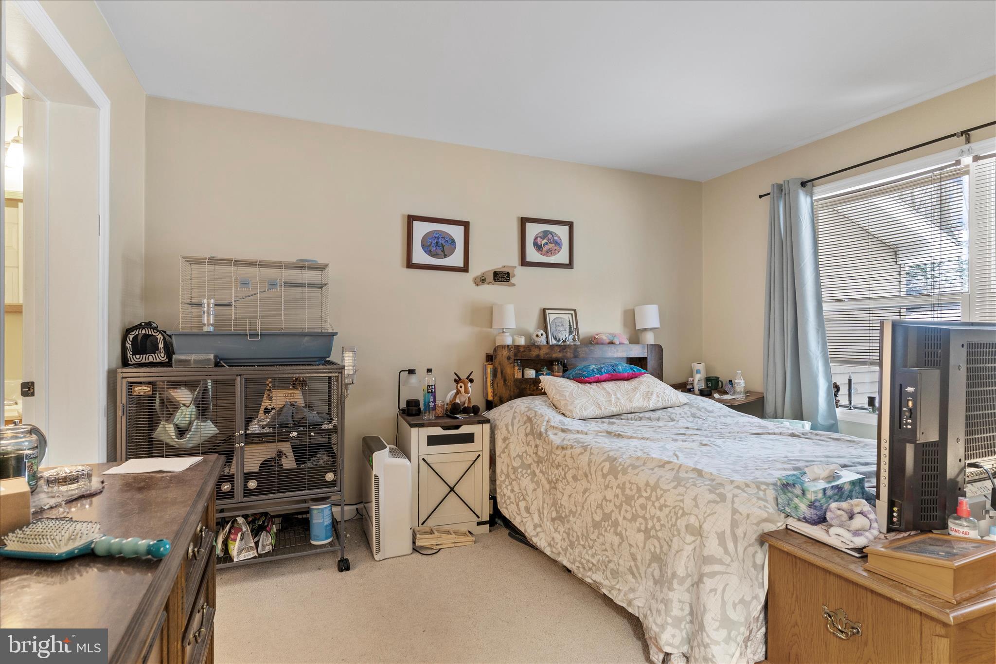 1565 Fox Hollow Road Shermans Dale, PA 17090 - Photo 23 of 41 a bedroom with a bed and a flat tv screen on the table