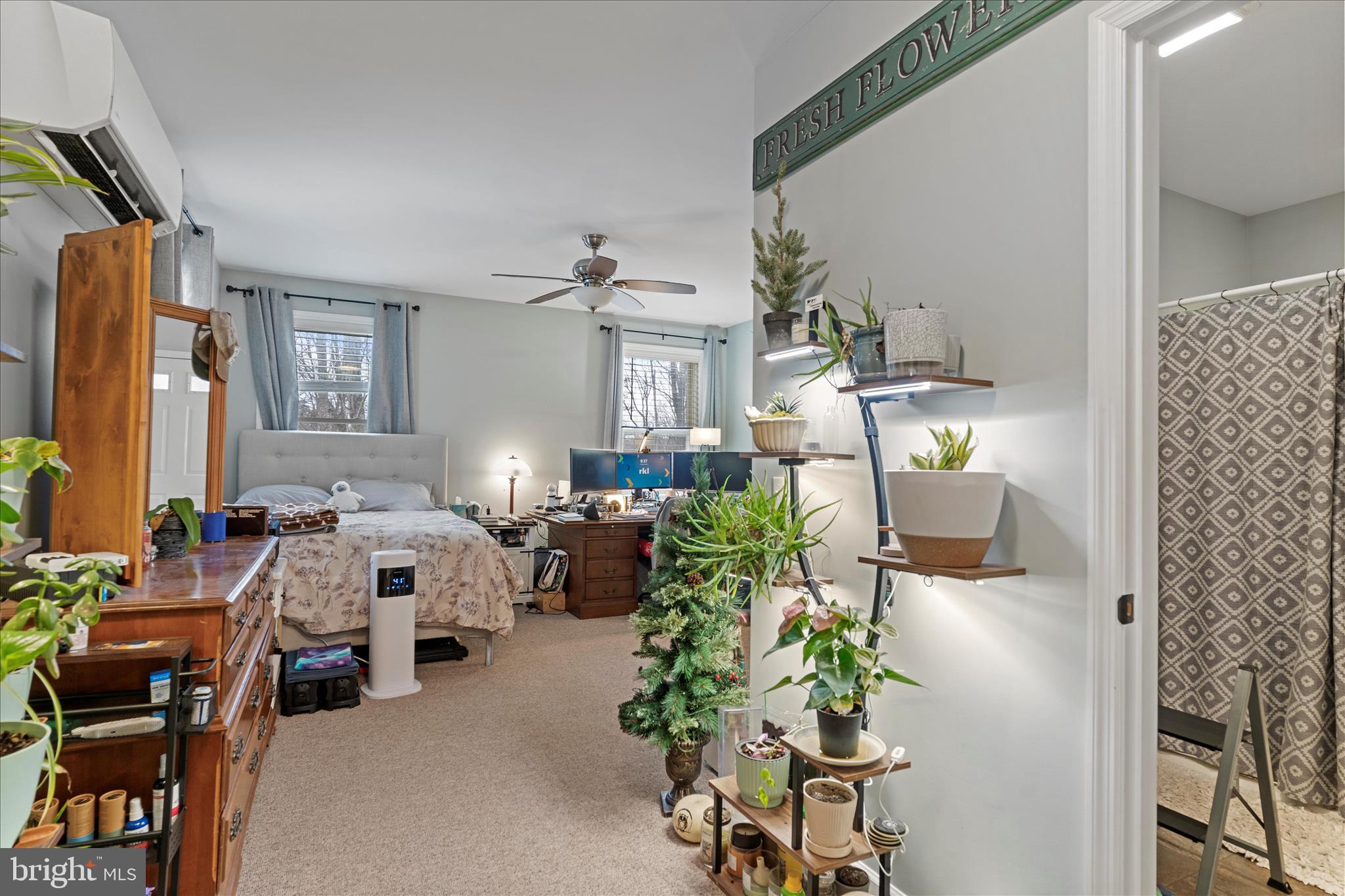 1565 Fox Hollow Road Shermans Dale, PA 17090 - Photo 25 of 41 a living room with furniture and a chandelier