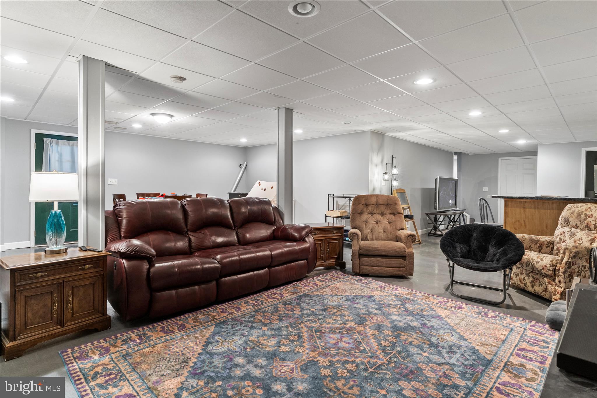 1565 Fox Hollow Road Shermans Dale, PA 17090 - Photo 33 of 41 a living room with furniture and a rug