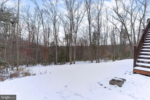 a view of snow on the road