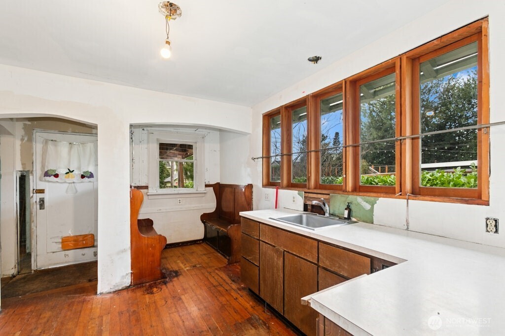 5627 44th Avenue Southwest Seattle, WA 98136 - Photo 11 of 37 a very nice looking living room with a large window