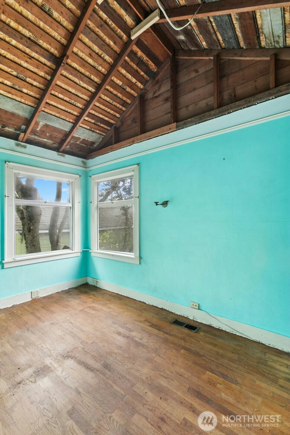 5627 44th Avenue Southwest Seattle, WA 98136 - Photo 15 of 37 a view of room with window and hardwood