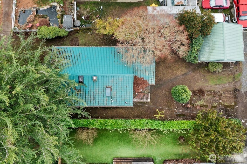 5627 44th Avenue Southwest Seattle, WA 98136 - Photo 37 of 37 an aerial view of a house with a yard