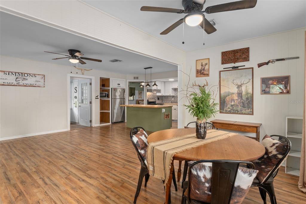 353 North Robin Hood Road Inverness, FL 34450 - Photo 22 of 59 a dining room with furniture and window