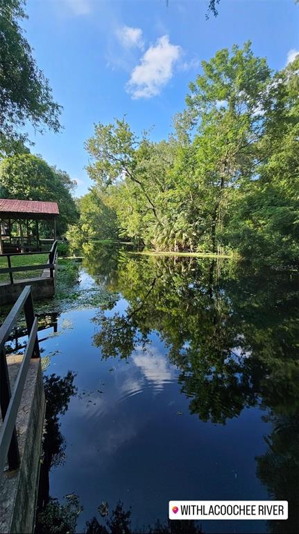 353 North Robin Hood Road Inverness, FL 34450 - Photo 46 of 59 a view of a lake with a mountain