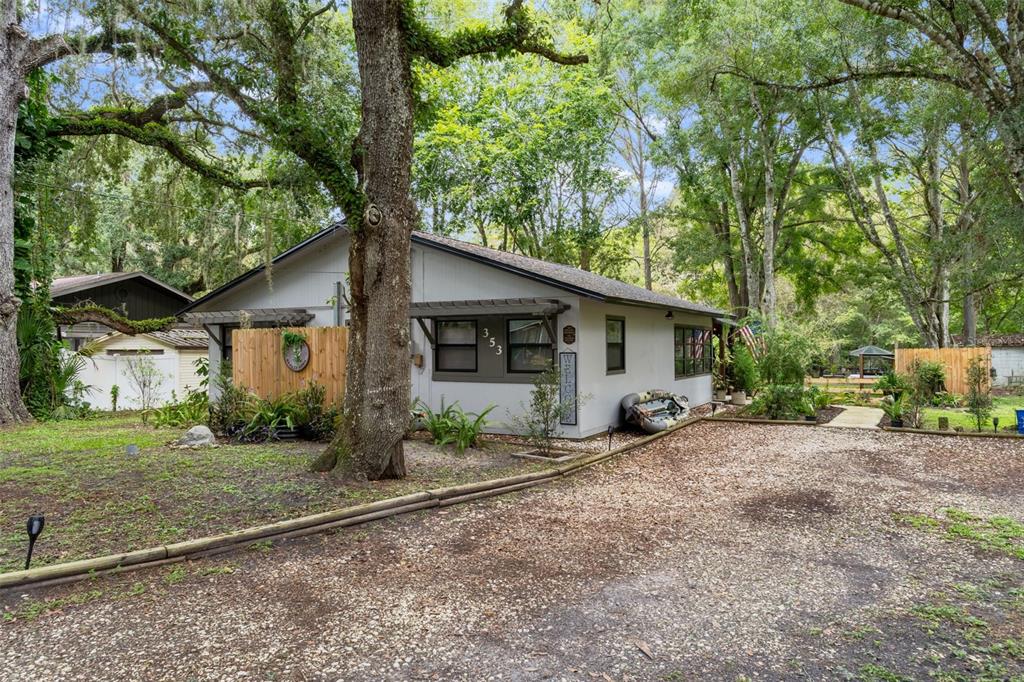 353 North Robin Hood Road Inverness, FL 34450 - Photo 5 of 59 a front view of a house with garden
