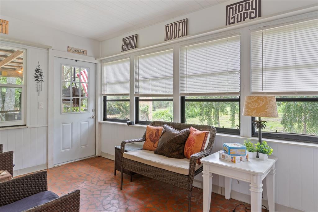 353 North Robin Hood Road Inverness, FL 34450 - Photo 9 of 59 a living room with furniture and a window