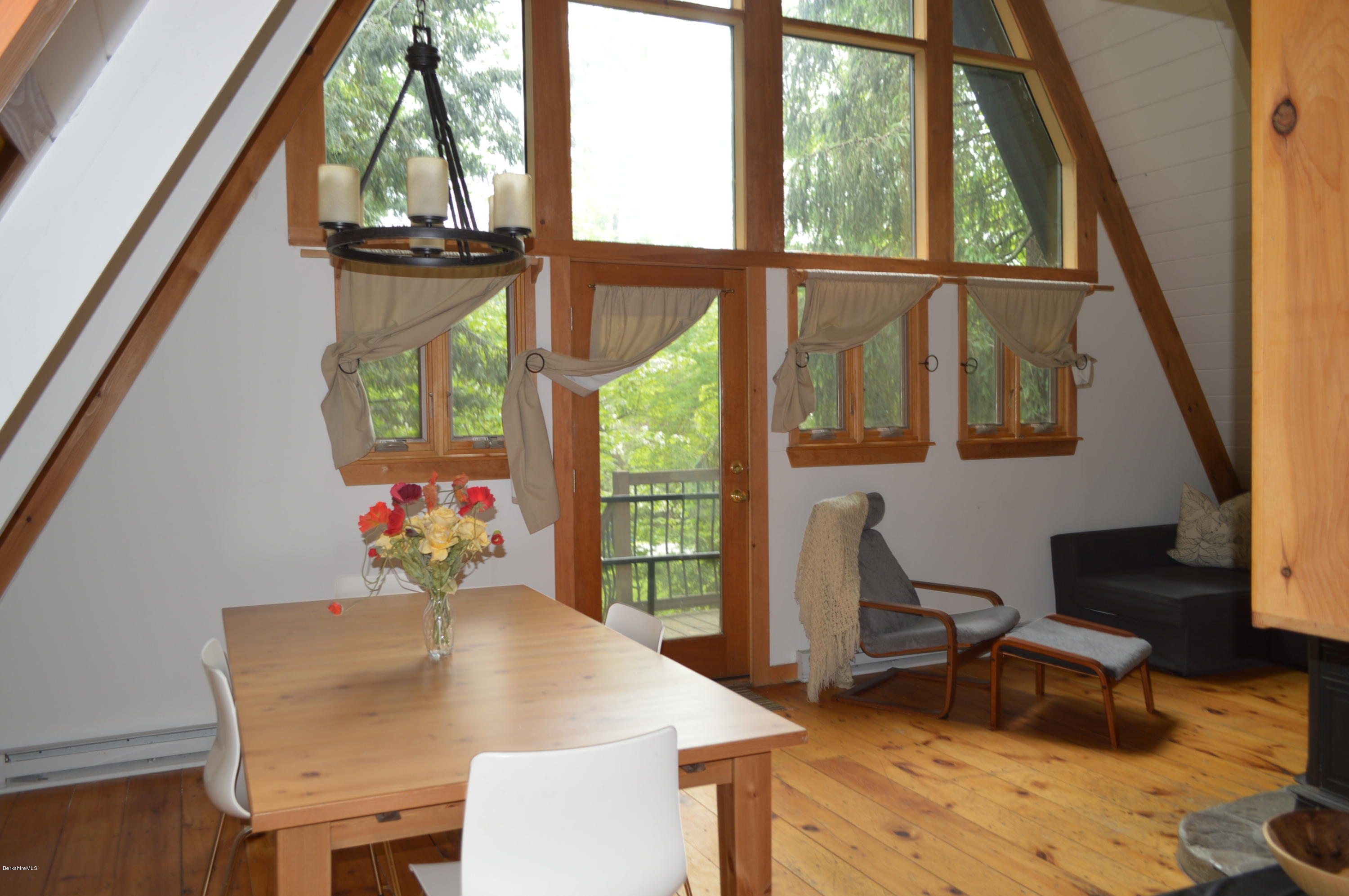 32 Chestnut Road Richmond, MA 01201 - Photo 22 of 31 a view of a dining room with furniture window and wooden floor