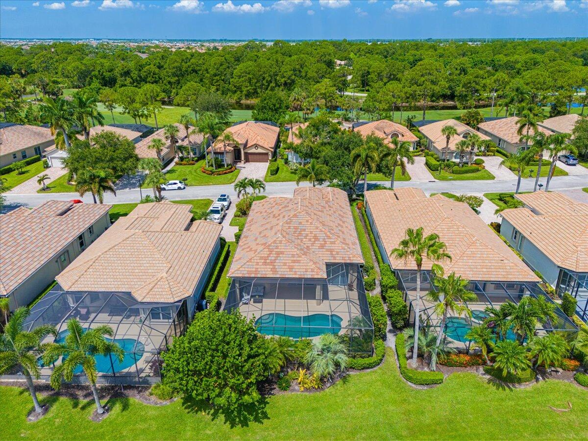8332 Muirfield Way Port St. Lucie, FL 34986 - Photo 11 of 55 an aerial view of a house with a yard