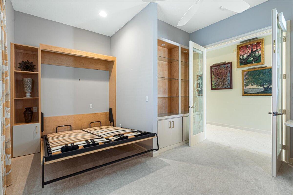 8332 Muirfield Way Port St. Lucie, FL 34986 - Photo 46 of 55 a living room with stainless steel appliances furniture a rug and a window