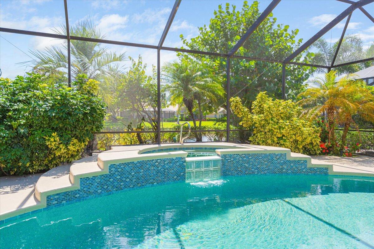 8332 Muirfield Way Port St. Lucie, FL 34986 - Photo 50 of 55 a view of yard with a swimming pool