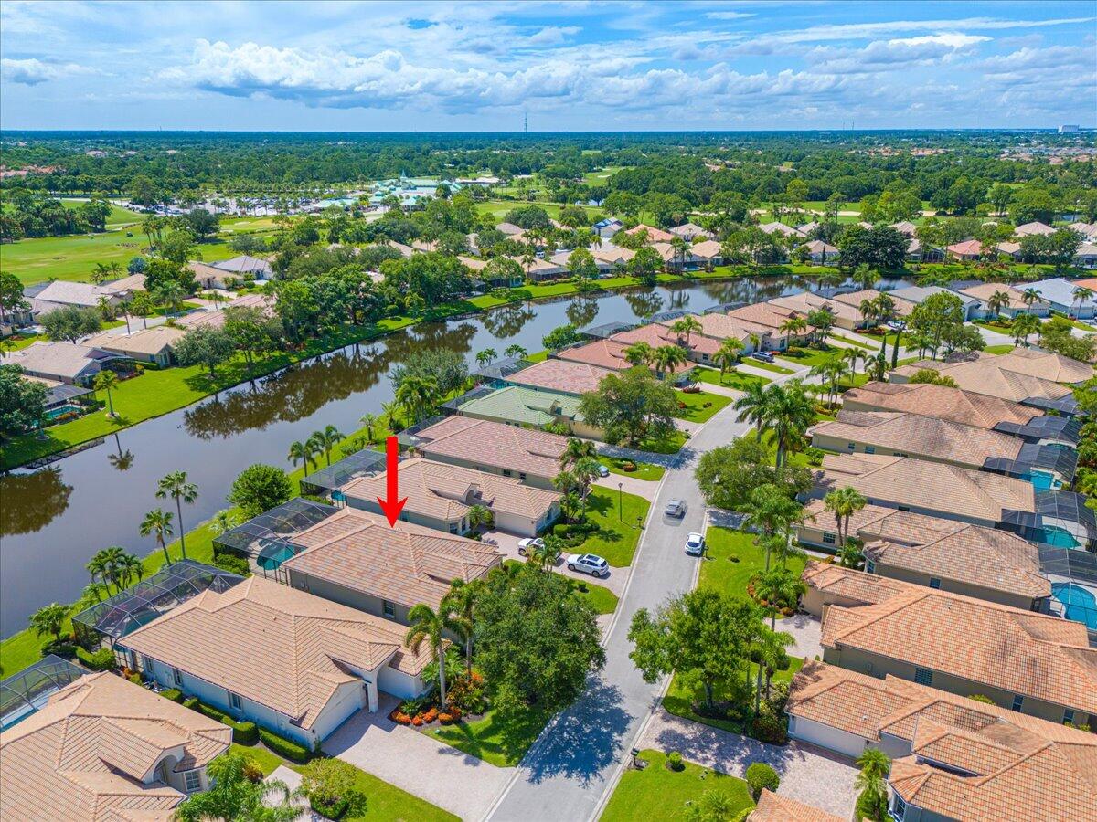 8332 Muirfield Way Port St. Lucie, FL 34986 - Photo 8 of 55 an aerial view of residential houses with outdoor space and river