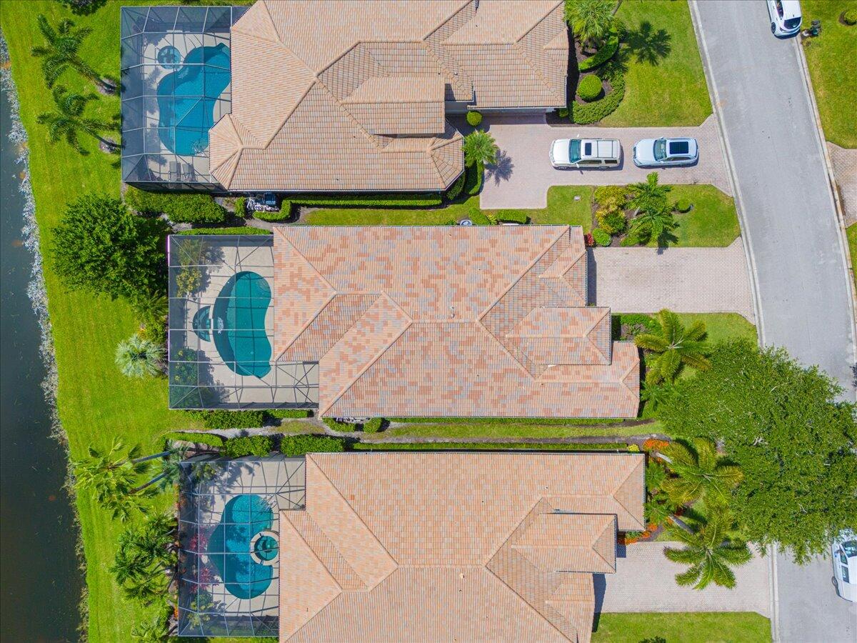 8332 Muirfield Way Port St. Lucie, FL 34986 - Photo 10 of 55 an aerial view of a house with a garden
