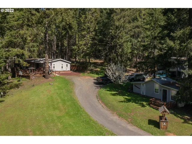 a view of a yard with an outdoor space