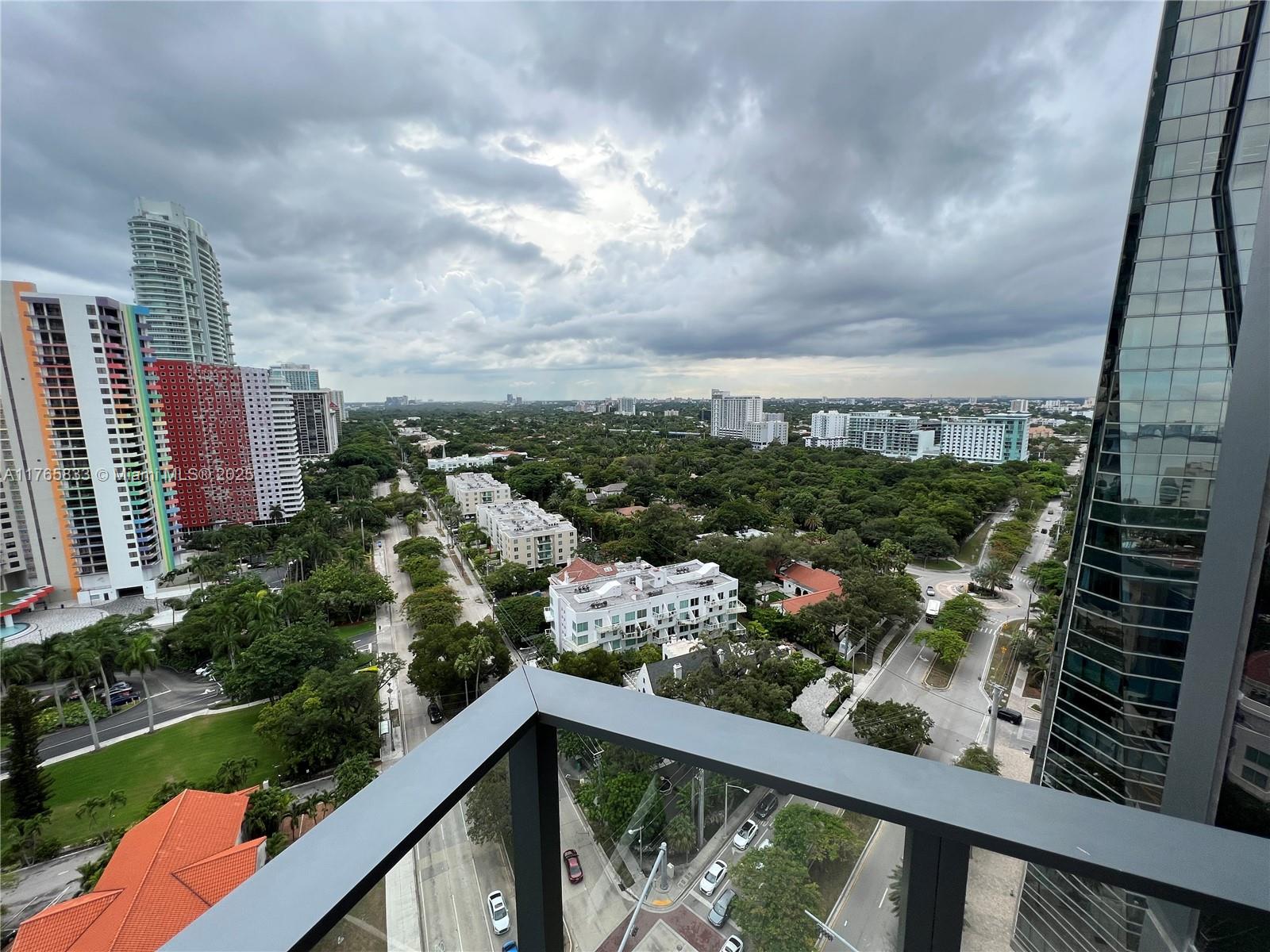 1451 Brickell Avenue, Unit 2004 Miami, FL 33131 - Photo 12 of 41 a view of a city from a balcony