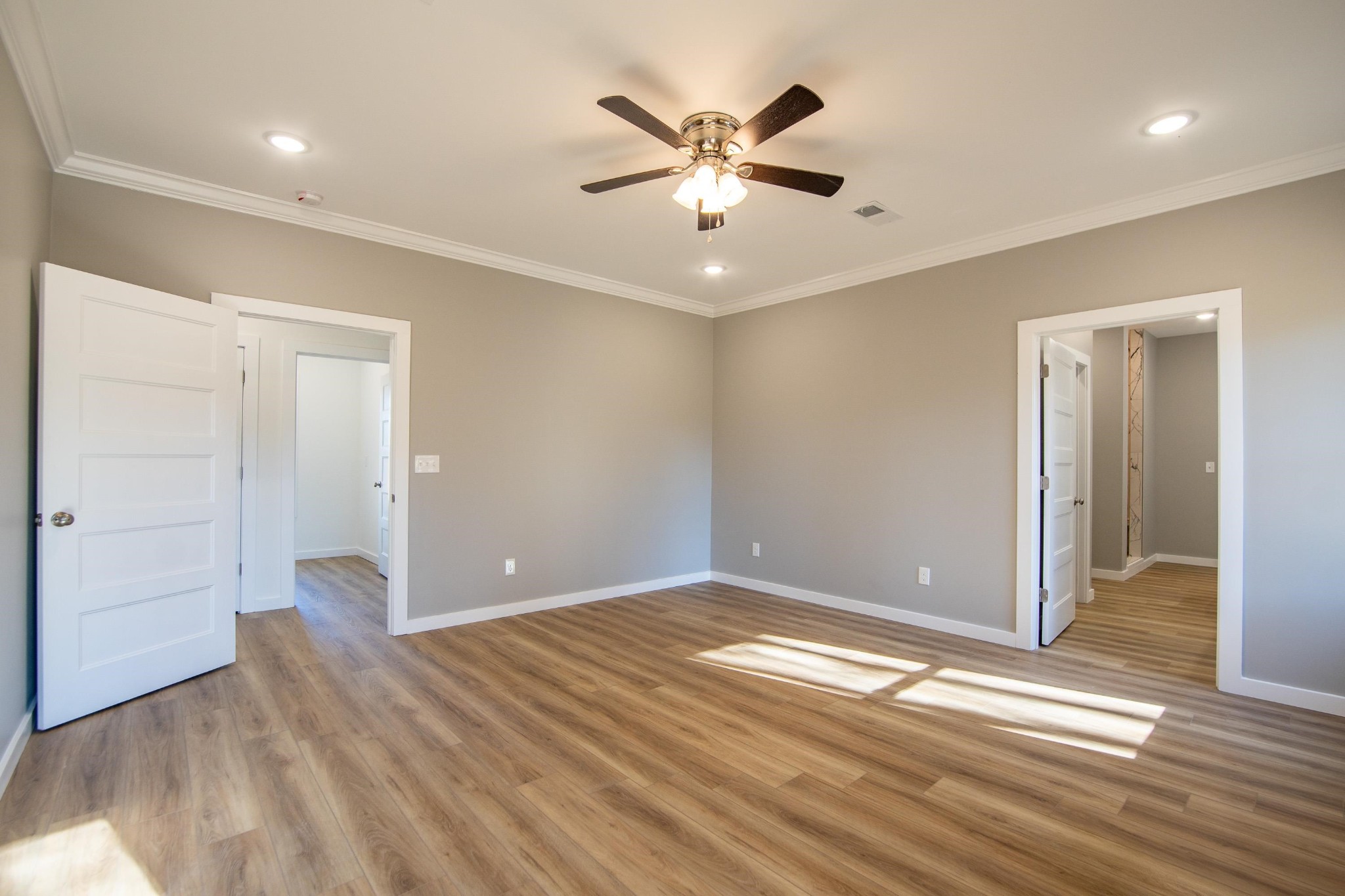 113 Braxton Lane Corinth, MS 38834 - Photo 17 of 39 a view of an empty room with wooden floor