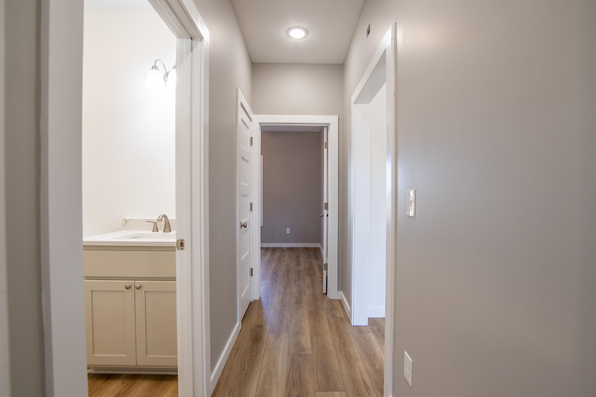 113 Braxton Lane Corinth, MS 38834 - Photo 27 of 39 a view of hallway with wooden floor