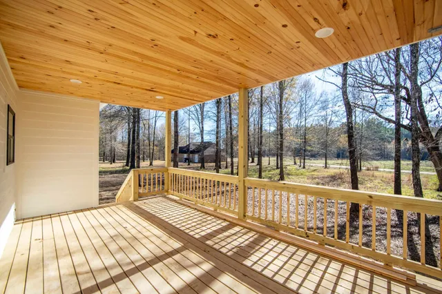 a view of steet with deck