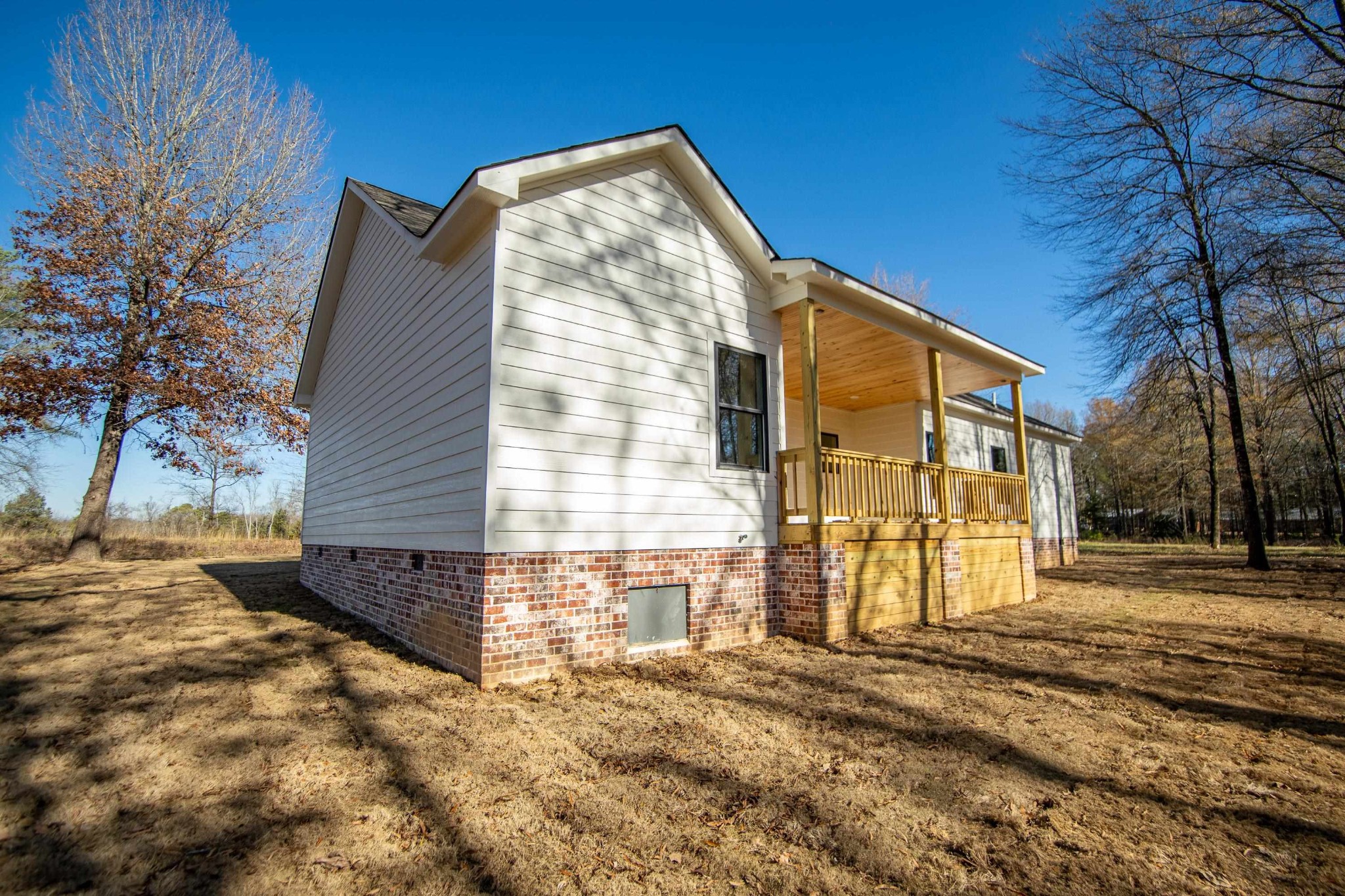 113 Braxton Lane Corinth, MS 38834 - Photo 34 of 39 a view of a house with a yard
