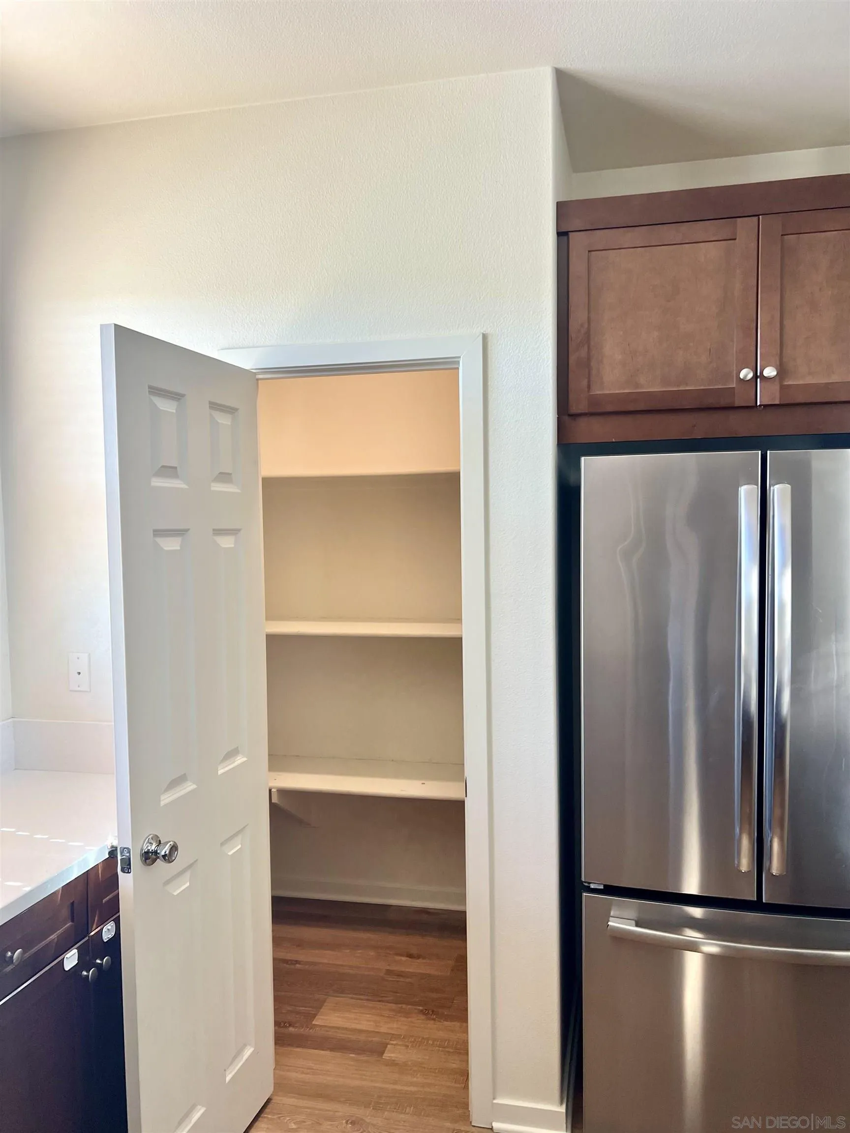 415 Mission Villas Road San Marcos, CA 92069 - Photo 11 of 23 a view of walk in closet with empty racks