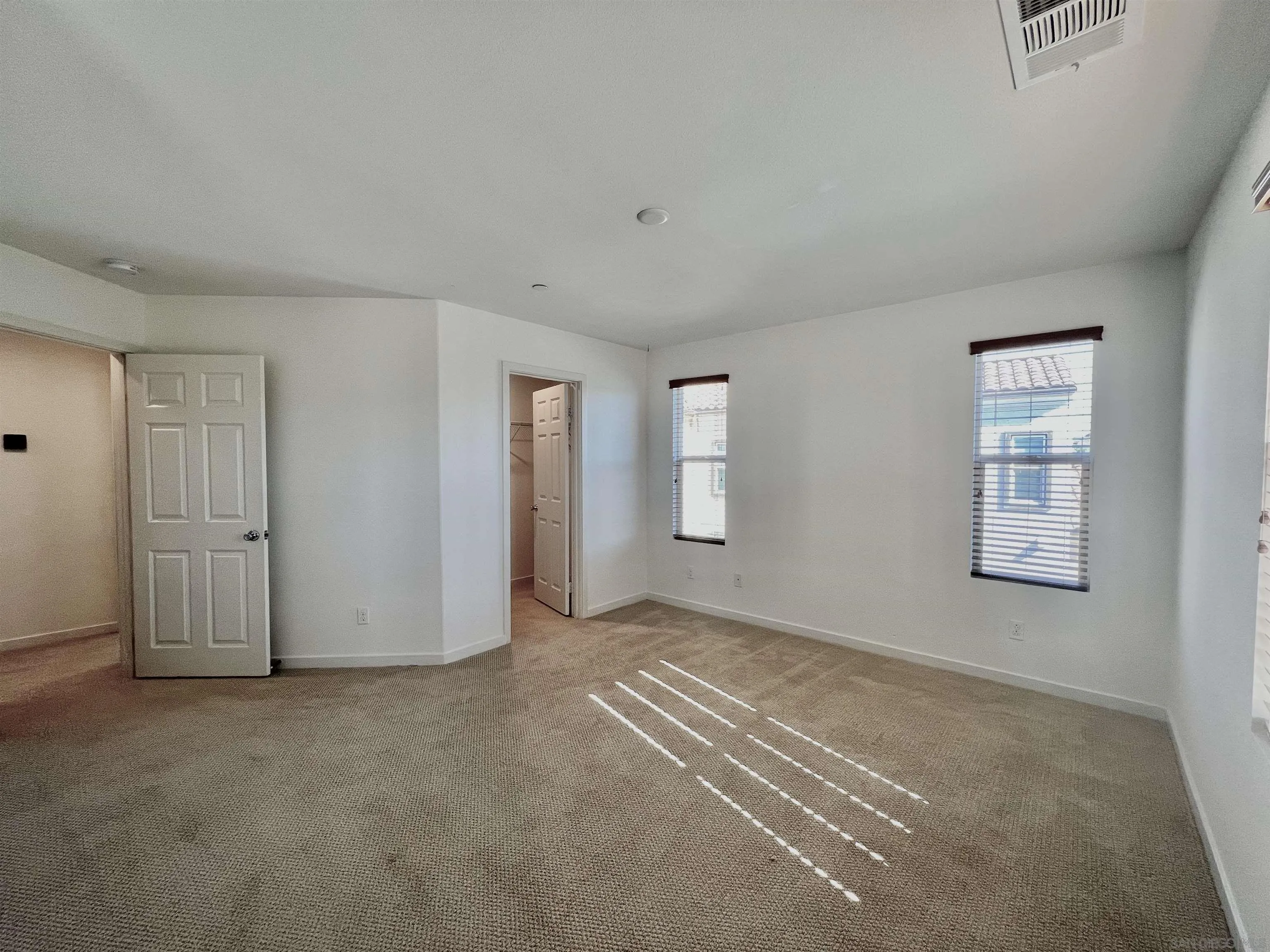 415 Mission Villas Road San Marcos, CA 92069 - Photo 16 of 23 a view of an empty room with windows