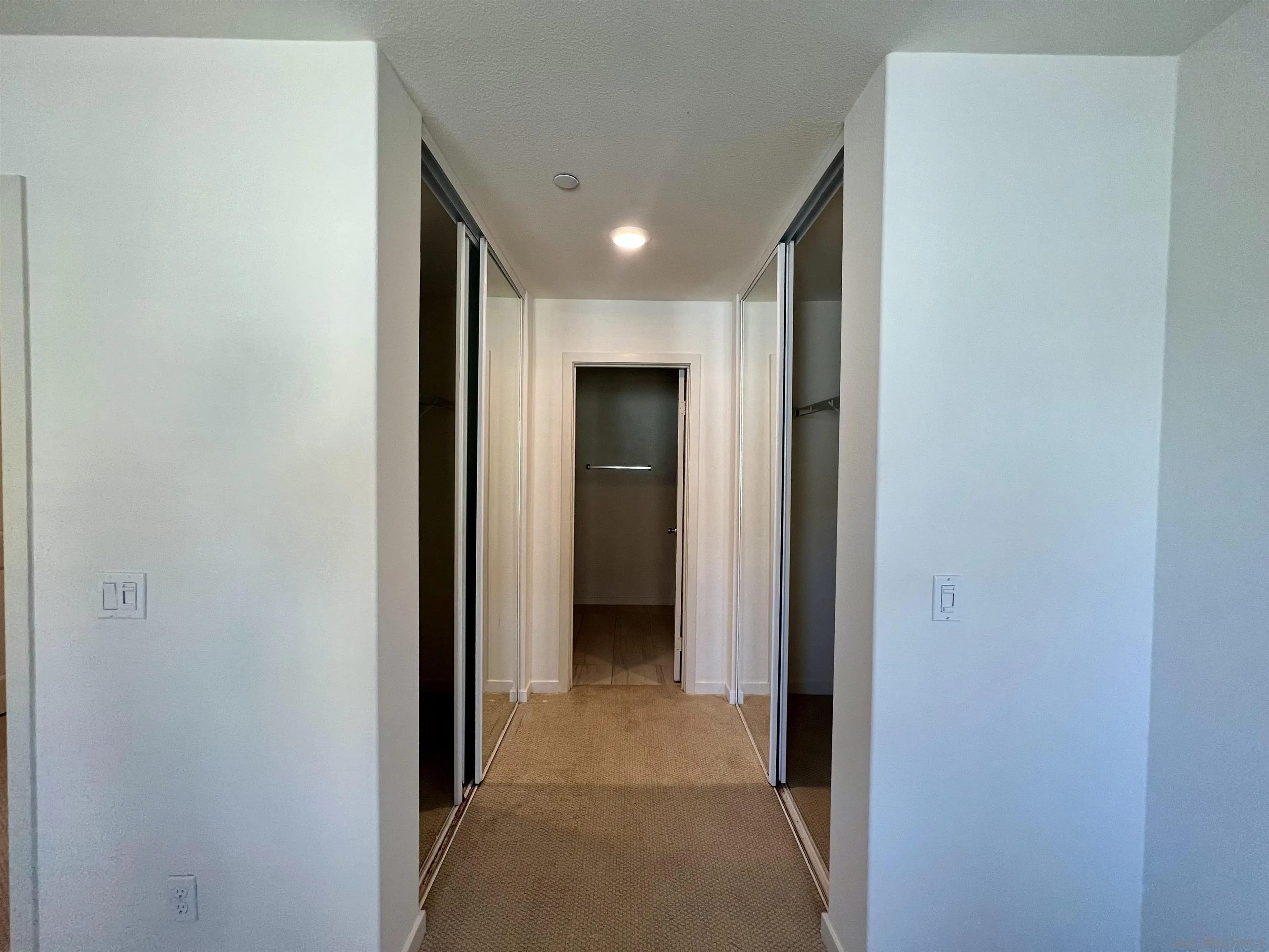 415 Mission Villas Road San Marcos, CA 92069 - Photo 20 of 23 a view of a hallway with wooden shelves