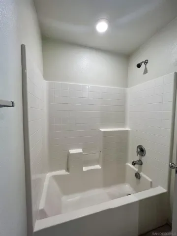 a bathroom with a bathtub