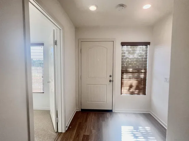 a view of an empty room and window