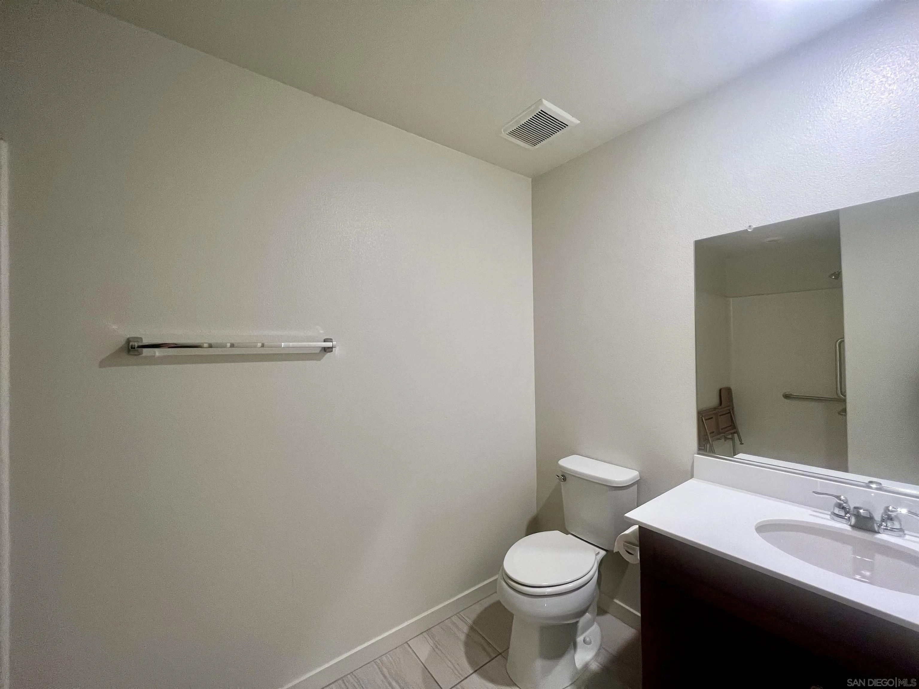 415 Mission Villas Road San Marcos, CA 92069 - Photo 7 of 23 a bathroom with a sink and a toilet