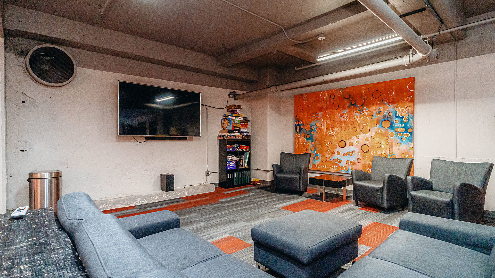 565 West Quincy Street, Unit 710 Chicago, IL 60661 - Photo 7 of 22 a living room with furniture and a flat screen tv