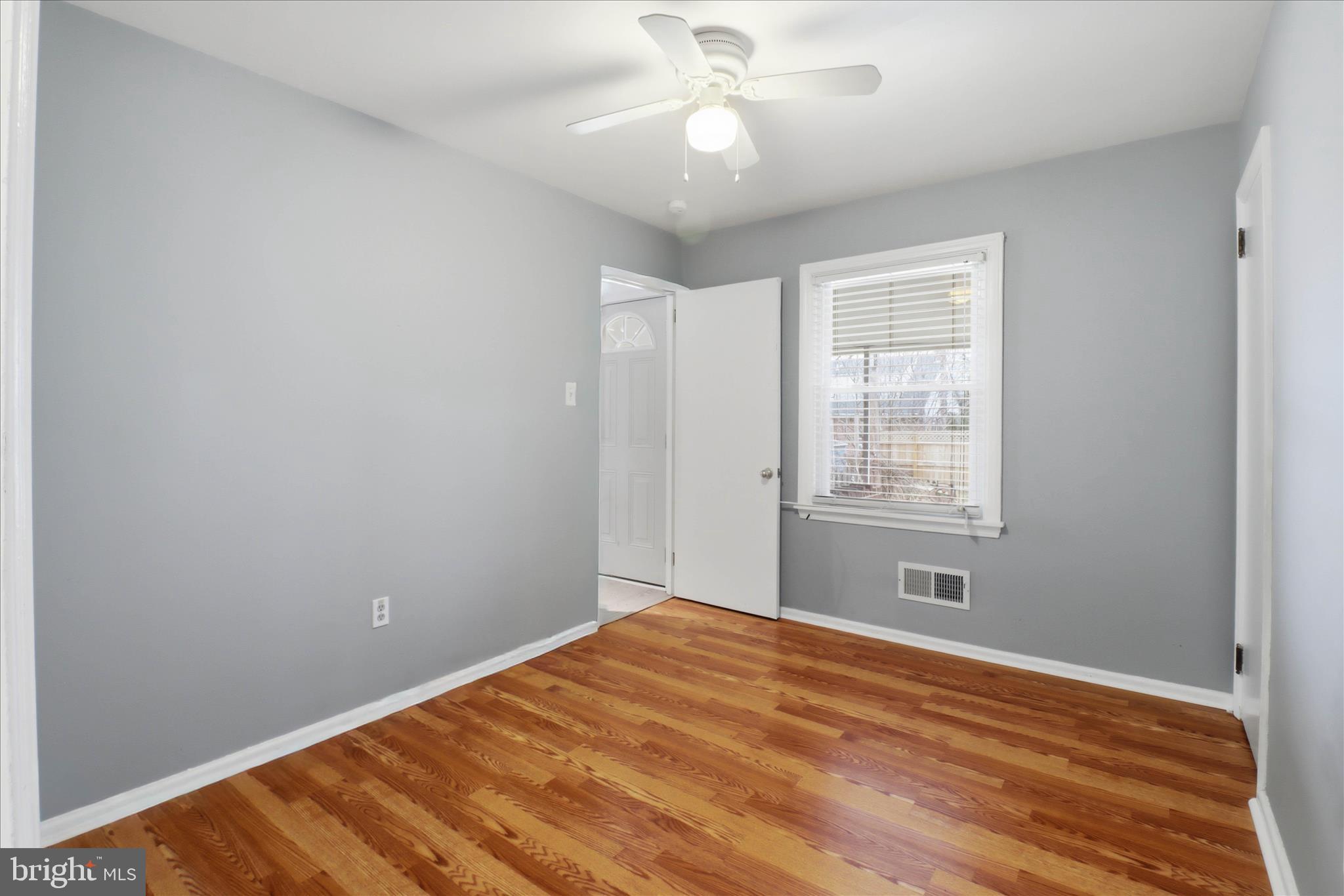 931 Rolridge Avenue Lancaster, PA 17603 - Photo 18 of 52 wooden floor in an empty room with a window