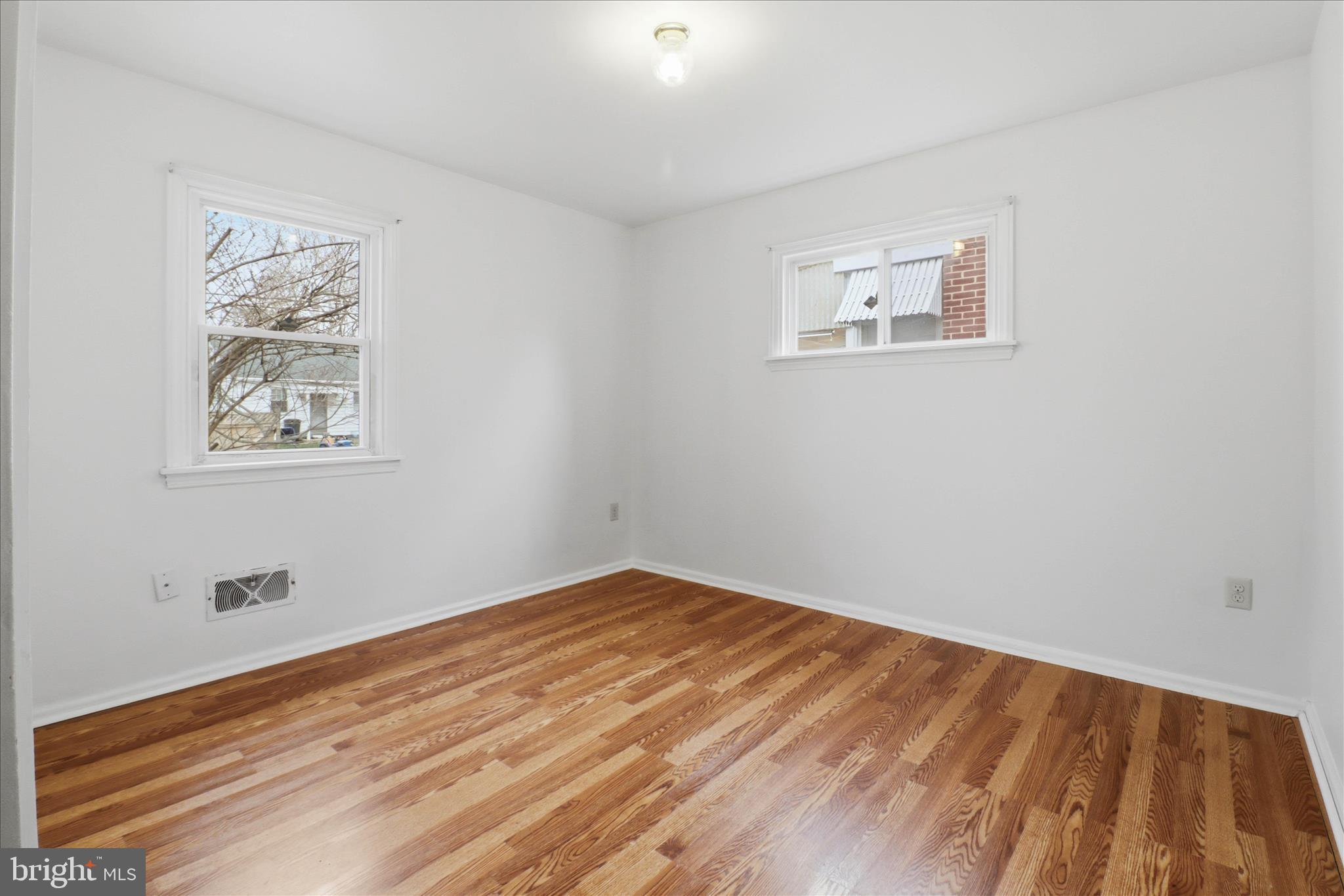 931 Rolridge Avenue Lancaster, PA 17603 - Photo 22 of 52 a view of empty room with wooden floor