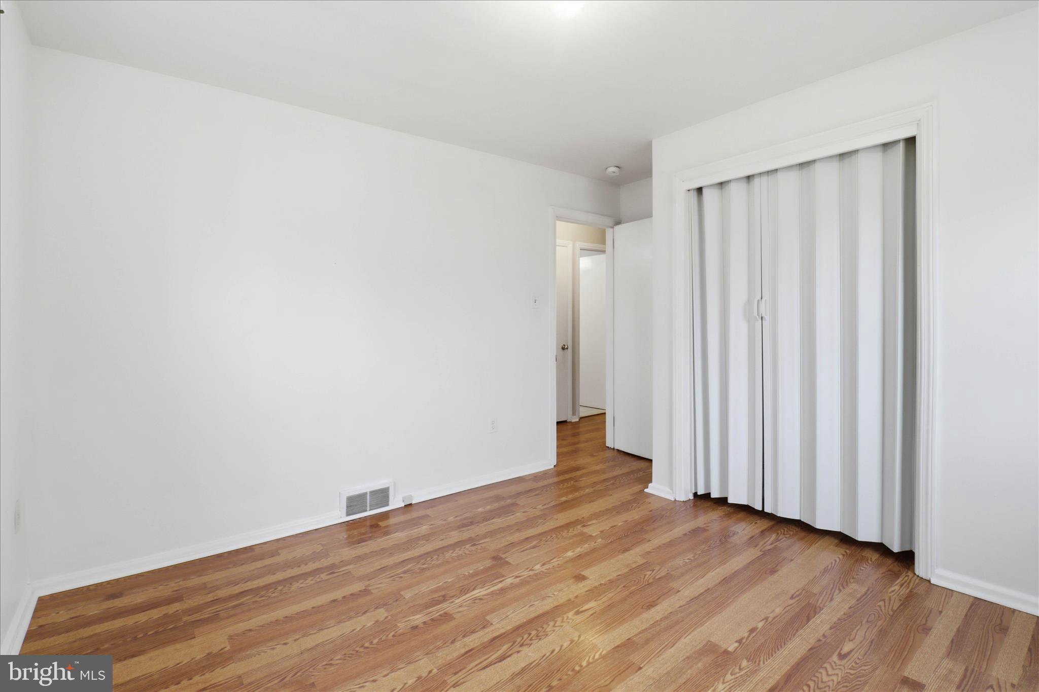 931 Rolridge Avenue Lancaster, PA 17603 - Photo 23 of 52 a view of a room with wooden floor and bench