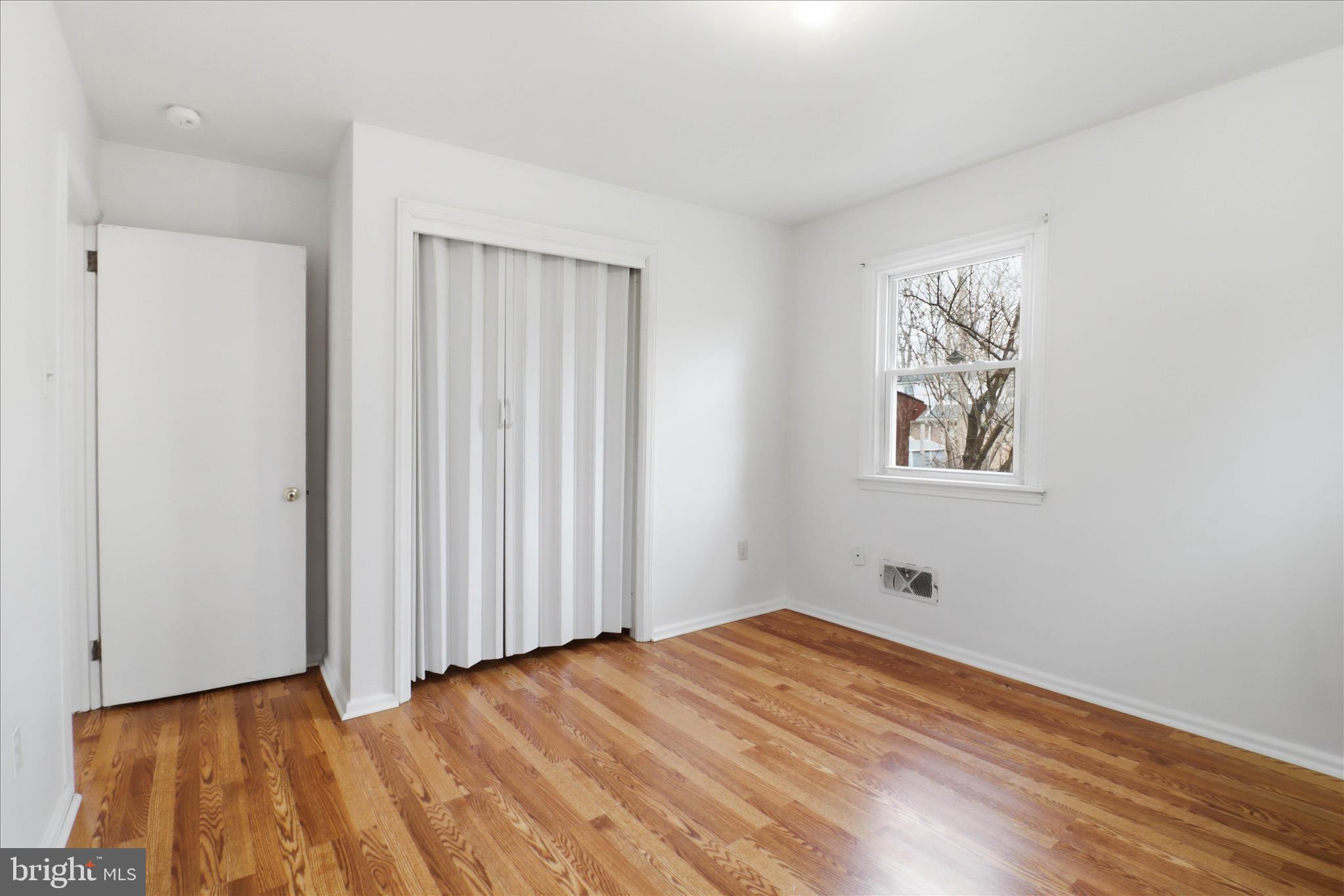 931 Rolridge Avenue Lancaster, PA 17603 - Photo 24 of 52 a view of empty room with wooden floor