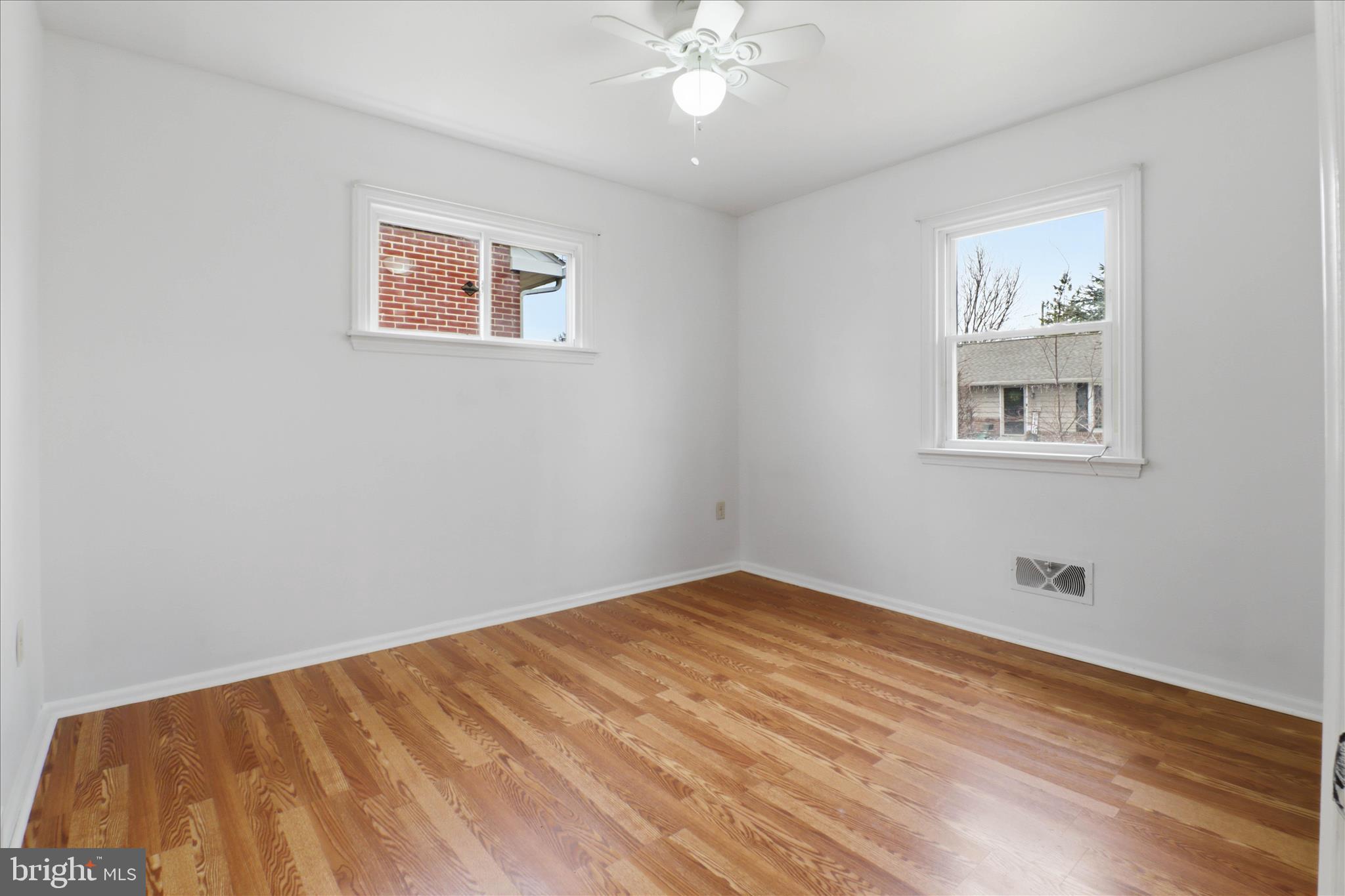 931 Rolridge Avenue Lancaster, PA 17603 - Photo 25 of 52 a view of a big room with wooden floor and windows