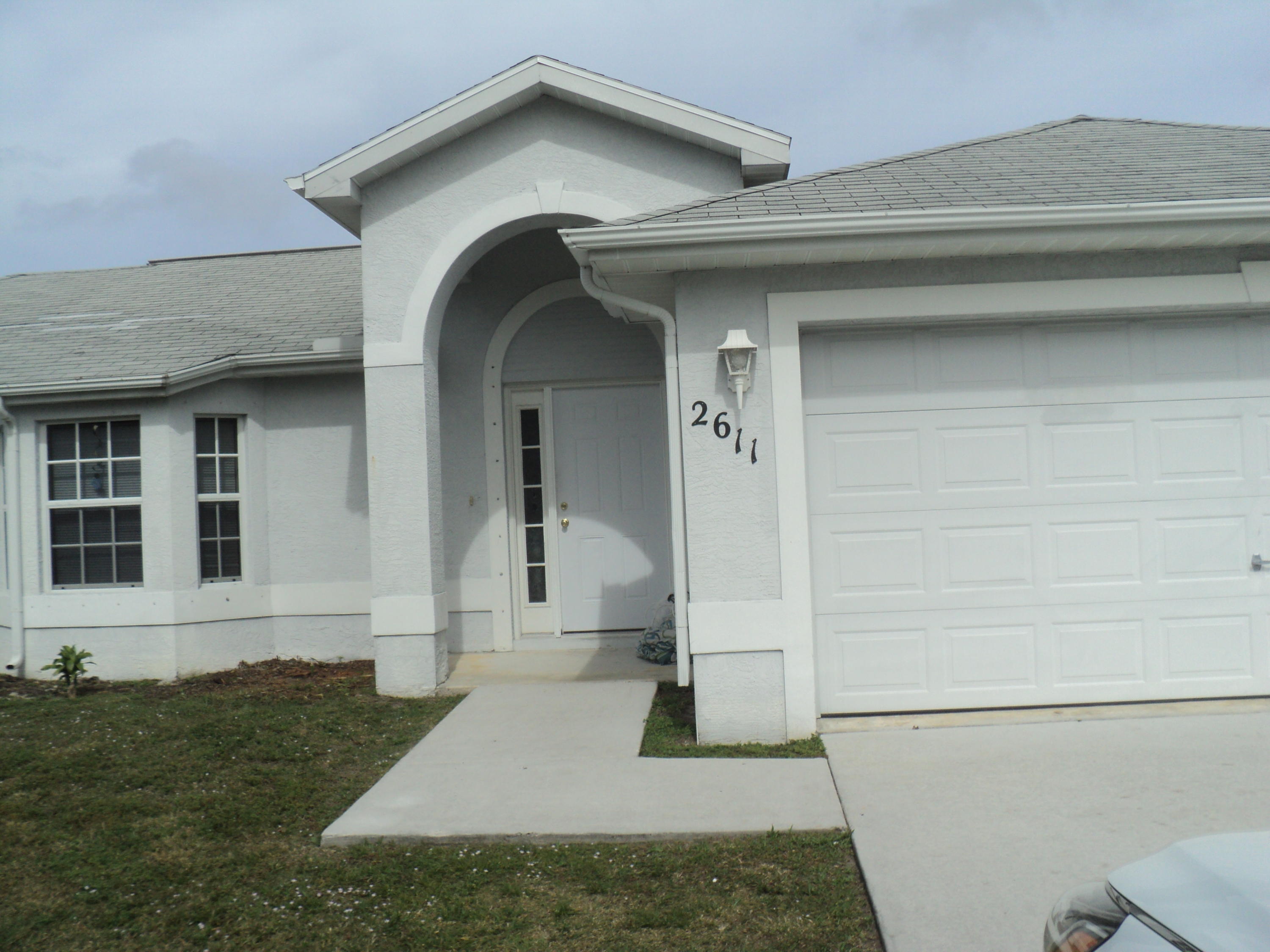 2611 Southwest Fairgreen Road Port St. Lucie, FL 34987 - Photo 1 of 1 FRONT