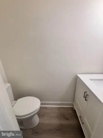 a bathroom with a toilet and a sink