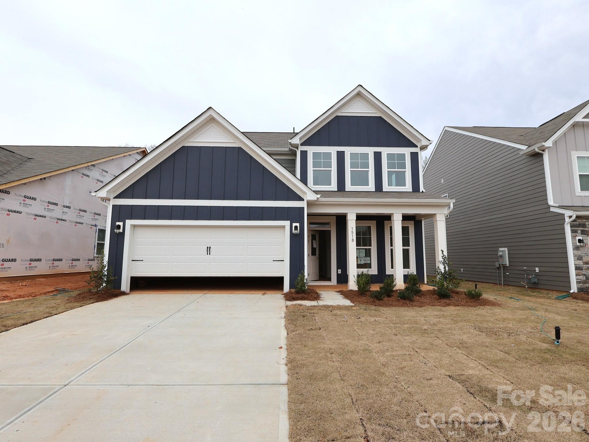 1518 Kate Cecil Way York, SC 29745 - Photo 1 of 4 a front view of a house with yard