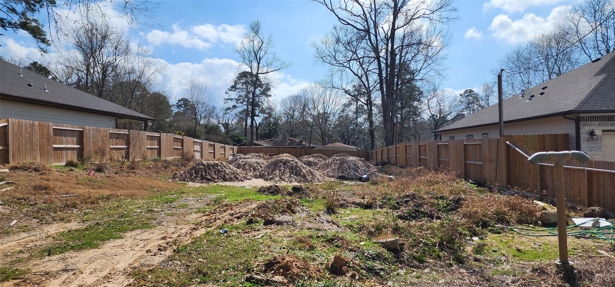 a view of a backyard of the house